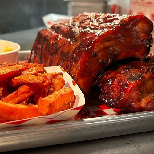 Smoked Ribs and Sweet Potato Fries, one of our barbecue specials near Agoura Hills, CA.