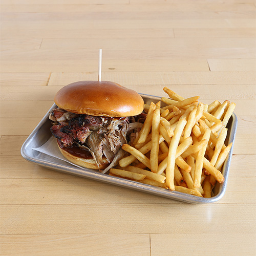 A BBQ sandwich and fries, one of our Calabasas barbecue deals.