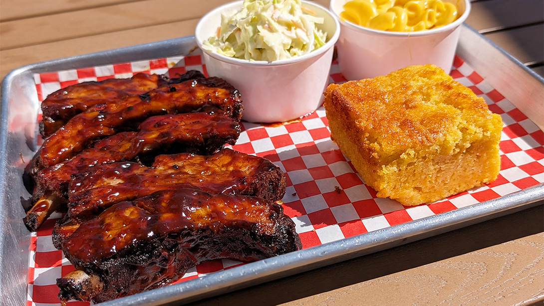 Best BBQ restaurant near First Neighborhood, Westlake Village CA serving ribs, cornbread, mac & cheese and coleslaw.